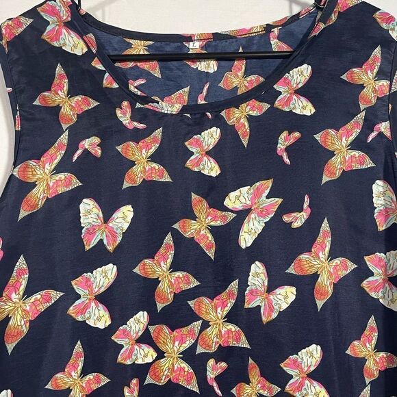 Sleeveless butterfly blouse - Picture 2 of 6